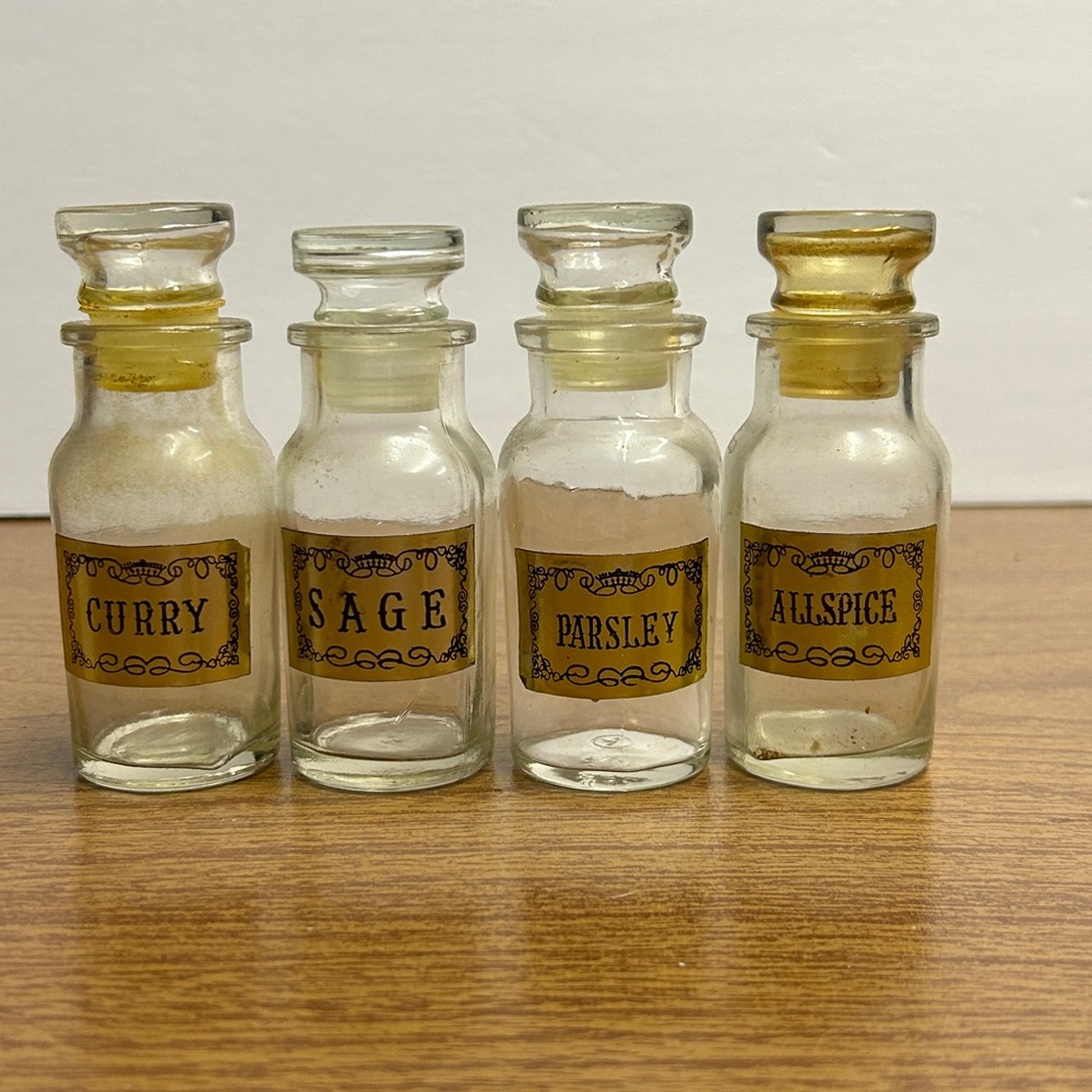 Four Vintage Glass Apothecary Spice Jars With Stoppers Empty with Gold Labels
